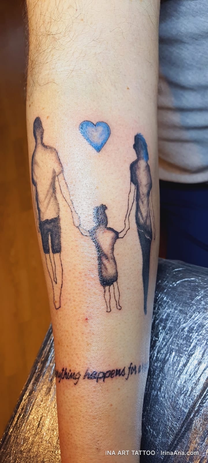 Forearm tattoo of family silhouettes (man, woman, child) holding hands, with a blue heart above. Below them, the text "every…