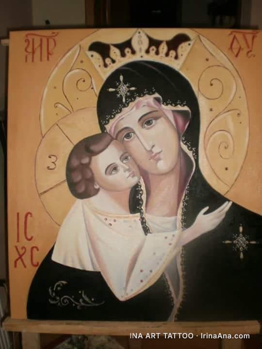 Religious icon painting depicting the Mother and Child in Byzantine style, against a golden background.