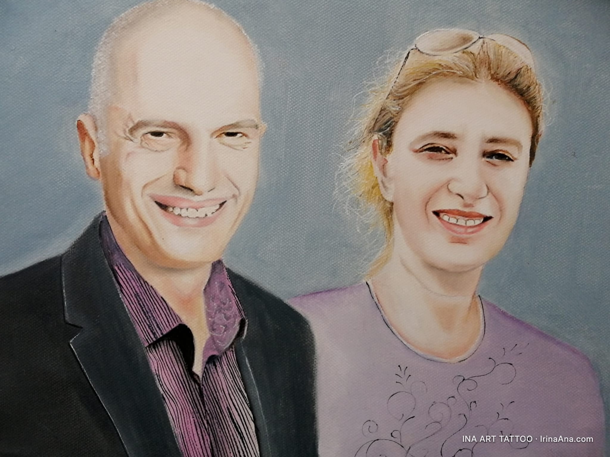 Painted portrait of a smiling bald man and a smiling blonde woman, against a blue-gray background.