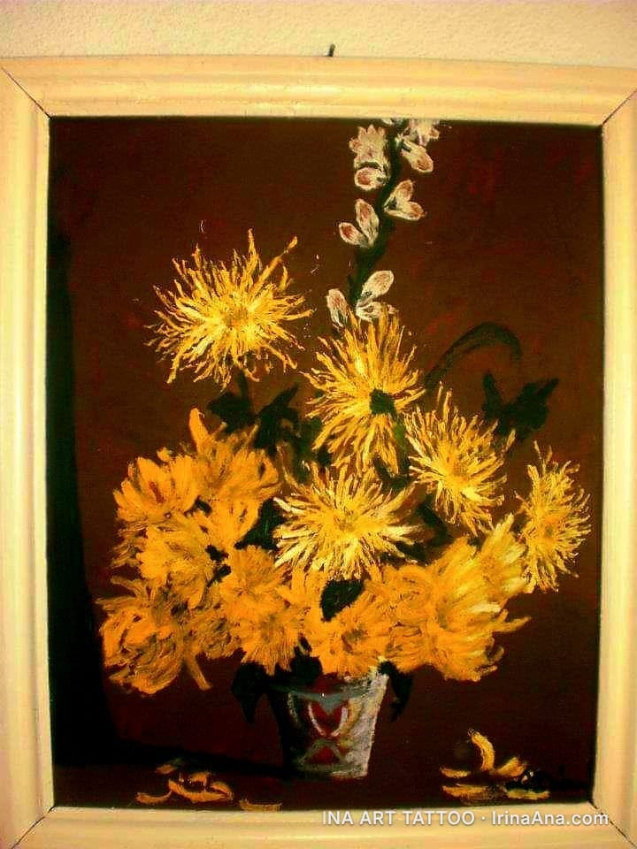 Oil painting of yellow chrysanthemums in a white vase against a dark brown background. Fallen petals lie at the base of the…