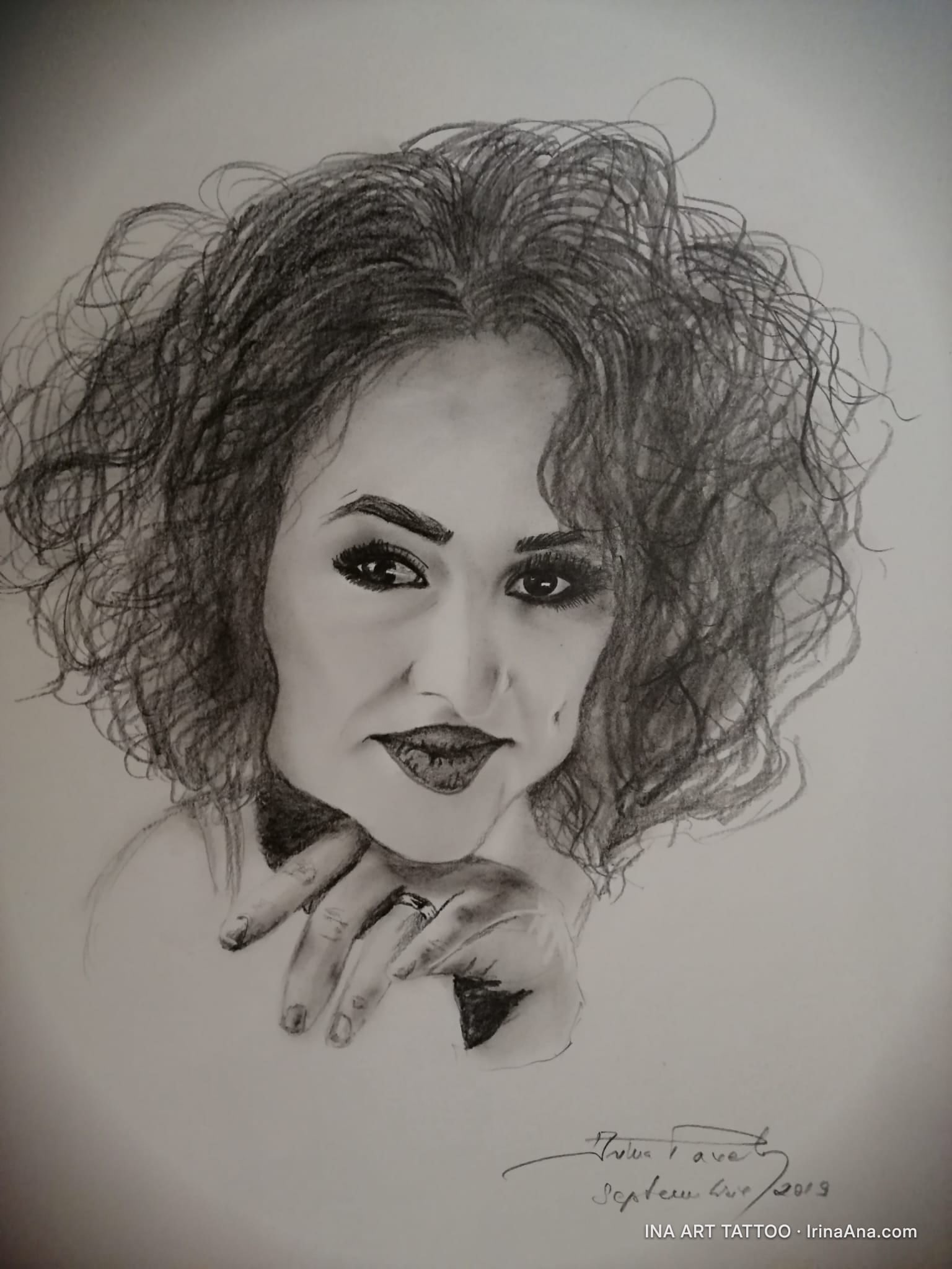 Pencil drawing of a woman with curly hair, intense gaze, and a hand resting on her neck, wearing a ring.